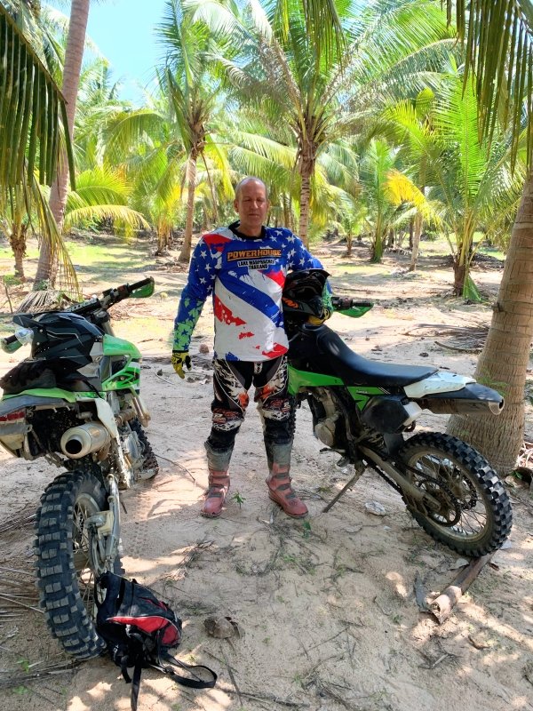 Dirt biking in Thailand can be exhausting in the hot sun. I appear to have lost the ability to open my eyes in this photo. 